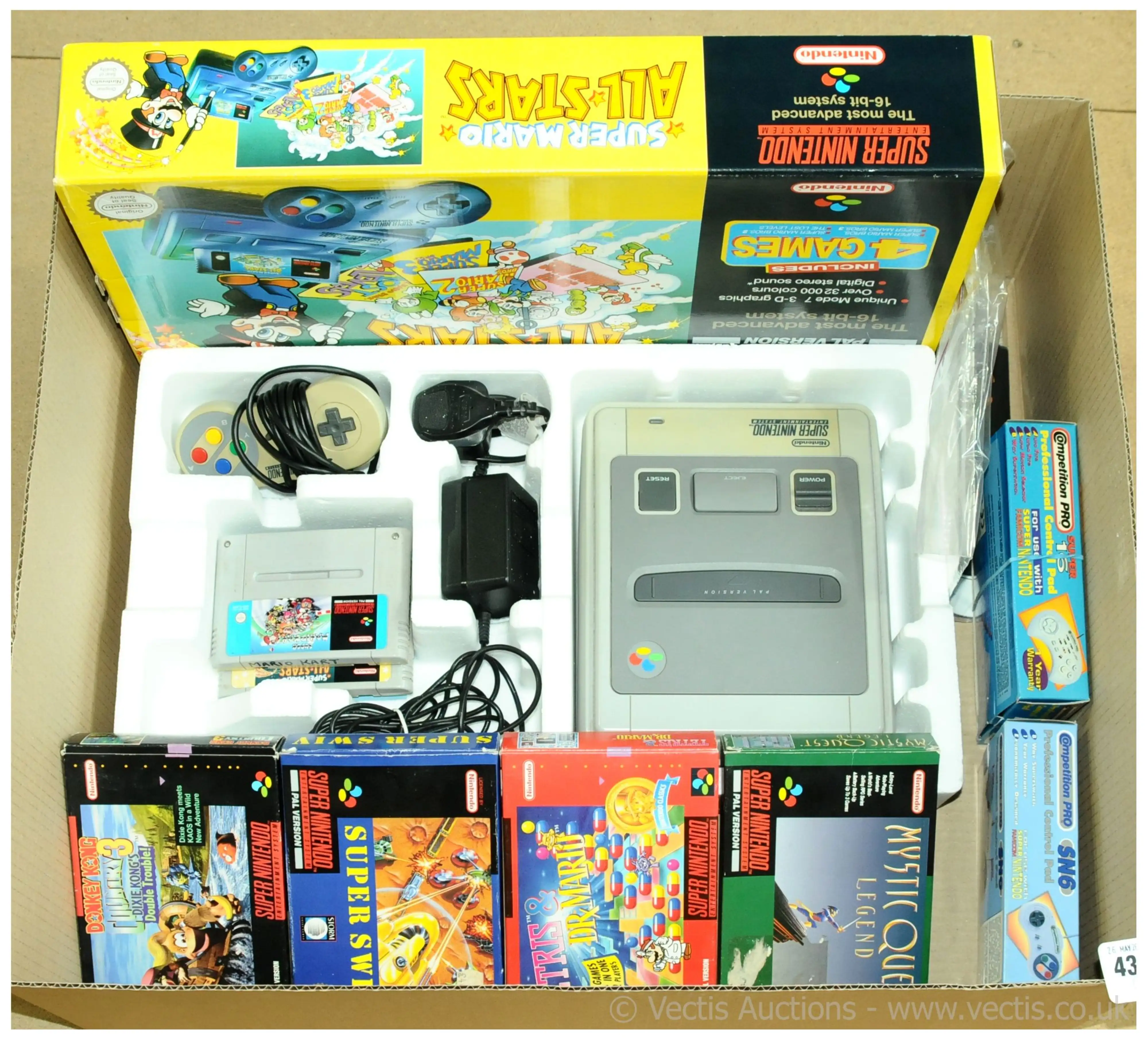 Nintendo a boxed gaming group to include a Super Nintendo Entertainment System Super Mario All...